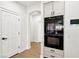 Modern kitchen area showcasing built-in oven at 9410 Stone Castle Way, Las Vegas, NV 89123