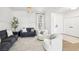 Stylish living room showcasing modern design and natural light at 9410 Stone Castle Way, Las Vegas, NV 89123