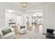 Spacious living area with an open floor plan and modern furnishings at 9410 Stone Castle Way, Las Vegas, NV 89123
