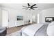 Bright primary bedroom featuring a fireplace and outdoor access at 9410 Stone Castle Way, Las Vegas, NV 89123