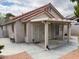 An exterior view of a covered patio with access to the home via a slider at 9600 Pacific View Dr, Las Vegas, NV 89117