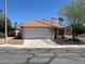 Charming single-story home with a terra cotta tiled roof and a well-maintained two-car garage in a desirable neighborhood at 9600 Pacific View Dr, Las Vegas, NV 89117