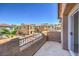 Balcony view of neighborhood, with wrought iron railing and nearby homes at 1097 Paradise Resort Dr, Henderson, NV 89002