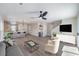 Bright, open living space with sleek flooring, a modern kitchen, and comfortable seating arrangements at 1097 Paradise Resort Dr, Henderson, NV 89002