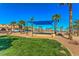 Neighborhood park with a blue awning, playground, and manicured lawn at 1097 Paradise Resort Dr, Henderson, NV 89002