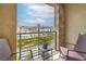 Cozy balcony featuring comfortable seating with views of the community and open space at 1120 Tektite Ave, Henderson, NV 89011