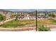 Exterior view of residential homes, landscaping, and street parking at 1120 Tektite Ave, Henderson, NV 89011
