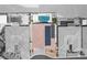 Aerial view of a home with a tile roof, solar panels, and a refreshing pool in a desert neighborhood at 11248 Rebel Dome Ct, Las Vegas, NV 89141