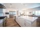 Open-concept kitchen with a view into the living room and dining area at 11248 Rebel Dome Ct, Las Vegas, NV 89141