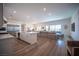 Bright, open-concept living space with modern finishes and a seamless flow to the dining and kitchen areas at 11248 Rebel Dome Ct, Las Vegas, NV 89141