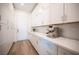 Walk-in pantry featuring abundant cabinet space and a quartz countertop at 11248 Rebel Dome Ct, Las Vegas, NV 89141