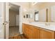 Double sink bathroom showing view into the bedroom at 1311 Rolling Sunset St, Henderson, NV 89052