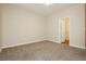 This bedroom has standard carpet, ceiling fan, closet, and connecting door at 1311 Rolling Sunset St, Henderson, NV 89052