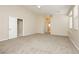 Neutral bedroom featuring carpet, a ceiling fan, and a window with blinds creating a spacious space at 1311 Rolling Sunset St, Henderson, NV 89052