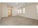 Neutral bedroom featuring carpet, a ceiling fan, and a window with blinds creating an open space at 1311 Rolling Sunset St, Henderson, NV 89052