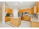 Kitchen boasts granite countertops, stainless steel appliances, and a functional center island at 1311 Rolling Sunset St, Henderson, NV 89052