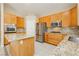 Well-equipped kitchen featuring granite countertops and stainless steel appliances at 1311 Rolling Sunset St, Henderson, NV 89052