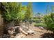 The tranquil water feature enhances the lush landscaping in this yard at 1311 Rolling Sunset St, Henderson, NV 89052