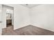 Bedroom with neutral carpet and an adjoining bathroom at 1405 Wintergreen Dr, Las Vegas, NV 89128