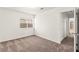 Empty bedroom with carpet, a window, and neutral walls at 1405 Wintergreen Dr, Las Vegas, NV 89128
