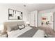 Staged primary bedroom with an ensuite bathroom at 1405 Wintergreen Dr, Las Vegas, NV 89128