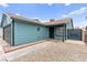 View of a single-story home with a tidy gravel yard, showcasing the home's curb appeal at 1405 Wintergreen Dr, Las Vegas, NV 89128
