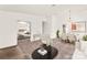 Open-concept living and dining space, showcasing stylish furnishings and access to the bedroom at 1405 Wintergreen Dr, Las Vegas, NV 89128