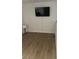 Bright, empty room with light wood floors ready for customization at 1512 Couples St, Las Vegas, NV 89128