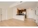 The open kitchen features stainless steel appliances, a breakfast bar, and ample cabinet space at 200 W Sahara Ave # 1102, Las Vegas, NV 89102