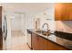 This kitchen offers granite countertops, stainless steel appliances, and opens to the living space at 200 W Sahara Ave # 1102, Las Vegas, NV 89102