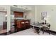 Kitchenette features stainless steel appliances, wood cabinets, and a breakfast bar with seating for two at 2000 Fashion Show Dr # 6109, Las Vegas, NV 89109