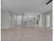 Open-concept living space featuring wood floors, neutral paint, and white trim at 2144 Mountain City St, Henderson, NV 89052