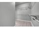 Spacious walk-in closet features ample shelving and sleek flooring, offering organized storage solutions at 2144 Mountain City St, Henderson, NV 89052