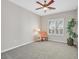 Cozy bedroom with shuttered windows and ceiling fan at 2292 Saxtons River Rd, Henderson, NV 89044
