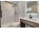 Updated bathroom with glass enclosed shower, vanity, and modern fixtures at 2315 Lincoln Rd, Las Vegas, NV 89115