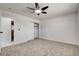 Bedroom with large closet, carpet, ceiling fan and access to other rooms at 2315 Lincoln Rd, Las Vegas, NV 89115