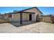 View of the carport and exterior of home with desert landscaping and fencing at 2315 Lincoln Rd, Las Vegas, NV 89115