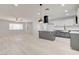 Open-concept kitchen with kitchen island, stainless appliances, and modern fixtures at 2315 Lincoln Rd, Las Vegas, NV 89115