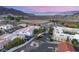 Real estate showcasing multiple well-maintained townhomes and parking at 251 Big Horn Dr, Boulder City, NV 89005
