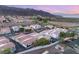 Real estate showcasing multiple well-maintained townhomes and beautiful sunset at 251 Big Horn Dr, Boulder City, NV 89005
