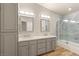 Stylish bathroom with a double sink vanity and a glass-enclosed shower at 251 Big Horn Dr, Boulder City, NV 89005