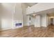 Spacious living room with modern fireplace, high ceilings, and hardwood floors at 251 Big Horn Dr, Boulder City, NV 89005