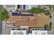 Overhead angle of a roof with solar panels, showcasing the property's layout and some surrounding yard space at 2528 Sunrise Ave, Las Vegas, NV 89101