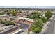 Aerial view showcasing a residential property with solar panels and a view of the city skyline at 2528 Sunrise Ave, Las Vegas, NV 89101