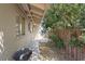 Side yard with partial fence and some vegetation at 2528 Sunrise Ave, Las Vegas, NV 89101
