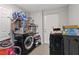 Laundry room features modern washer and dryer and storage space for convenience and organization at 2528 Sunrise Ave, Las Vegas, NV 89101