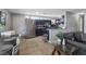 Living room, with an open layout, connects to the kitchen and dining area. Stainless steel appliances at 2528 Sunrise Ave, Las Vegas, NV 89101