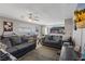 Open concept living room seamlessly flows into the kitchen, featuring comfortable seating and natural light at 2528 Sunrise Ave, Las Vegas, NV 89101