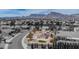 Aerial view of home with desert landscape, privacy wall, and covered patio at 2532 Big Timber Dr, Las Vegas, NV 89134