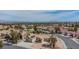 Home with mountain views, tile roof, desert landscaping, and attached garage at 2532 Big Timber Dr, Las Vegas, NV 89134